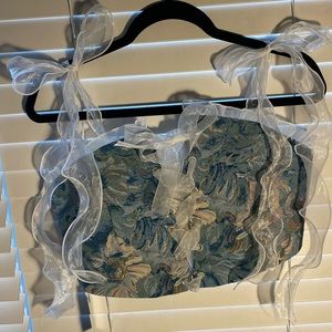 floral corset with iridescent ribon